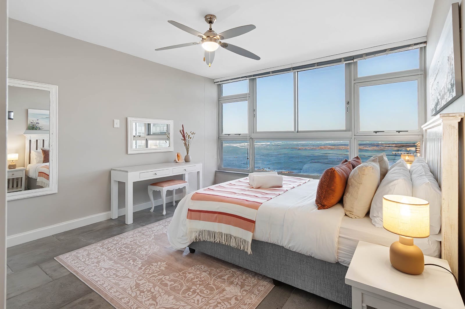 Main bedroom with queen bed and ocean view